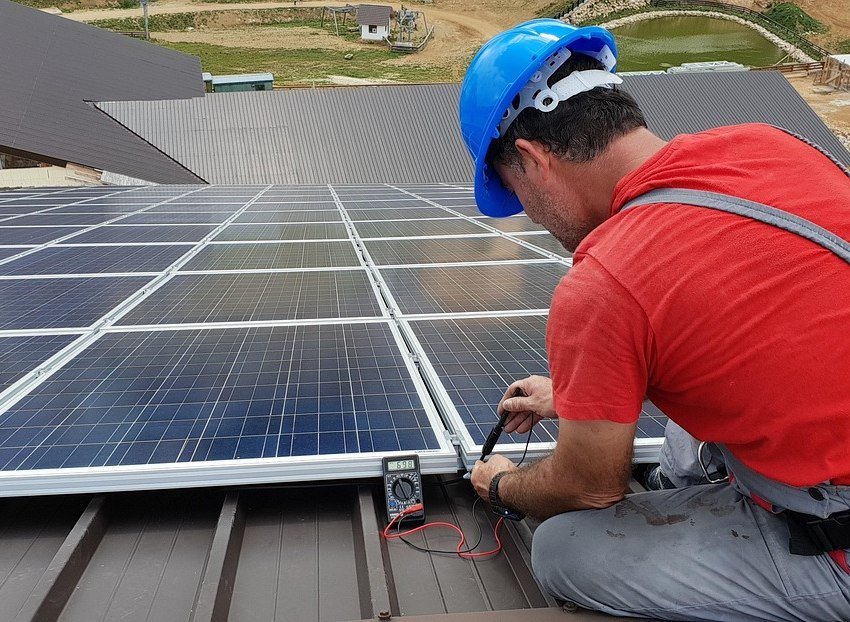 Technician maintaining a solar installation